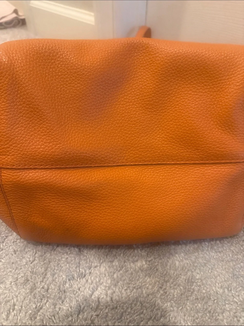 Michael Kors Orange Pebbled Leather Tote with Tassel Charm-never worn!